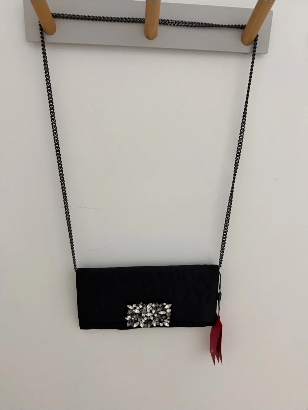 Carolina Herrera Black Quilted Crossbody with Crystal Brooch and Red Tassel
